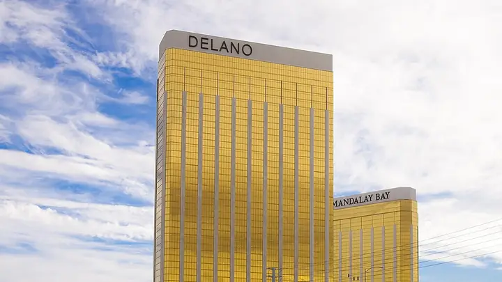 The gold W Las Vegas tower, then called Delano, beside Mandalay Bay